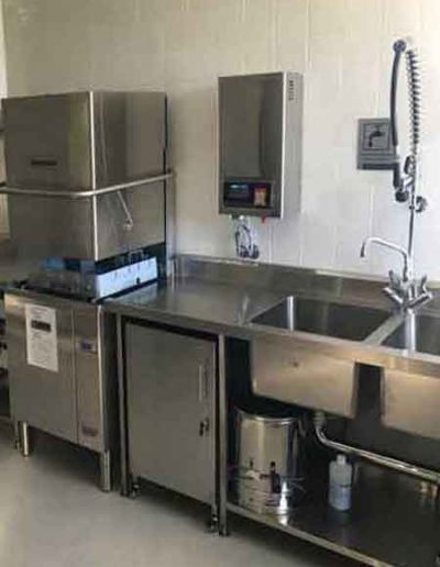 commercial stainless steel stove and sink